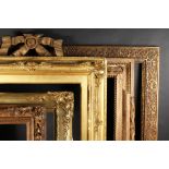 A 19th Century Ribbon Topped Frame with Scrolling Garlands, 28" x 33" - 71cm x 84cm. And Four