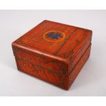 A CHINESE RED LACQUER SQUARE FORM CALLIGRAPHIC BOX & COVER, the base with a gilded mark, 12cm