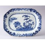 AN 18TH CENTURY CHINESE BLUE & WHITE PORCELAIN SERVING DISH, decorated with a native landscape view,