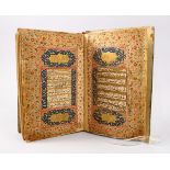 AN EARLY 18TH CENTURY INDO PERSIAN KASHMIRI QURAN, signed " muhamad muhdi and dated 1110, the