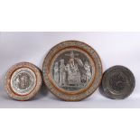 THREE ISLAMIC 19TH CENTURY SILVERED COPPER CIRCULAR CHARGERS, both decorated with scenes of imperial