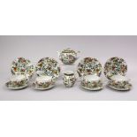 AN ORIENTAL FAMILLE ROSE PORCELAIN PART TEA SERVICE, WITH FLORAL DECORATION, the bases with black