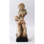 A RARE AND LARGE 2ND CENTURY BC INDIAN CLAY FIGURE OF A MOTHER, stood originally holding a child,