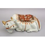 A GOOD JAPANESE MEIJI PERIOD KUTANI PORCELAIN MODEL OF A RECUMBENT OXEN / WATER BUFFALO, the buffalo