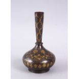 AN 18TH / 19TH CENTURY ISLAMIC GOLD INLAID STEEL VASE, the gold inlay with formal decoration, 13cm.