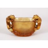 A GOOD CHINESE PEKING GLASS TWIN HANDLE LIBATION CUP, the sides with climbing kylin as handles, 12cm