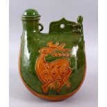 AN UNUSUAL CHINESE BISCUIT AND GREEN GLAZED POTTERY CHILDRENS PORTABLE TOILET, the vessel