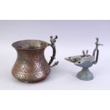 A GOOD ISLAMIC TWIN SPOUT BRONZE OIL POURER & A COPPER CALLIGRAPHIC DISH, 14cm high & 12cm.