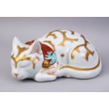 A GOOD JAPANESE MEIJI PERIOD KUTANI PORCELAIN CAT, modelled asleep, with gilt decoration, 11cm