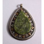 A GOOD ISLAMIC CARVED JADE SEAL & WHITE METAL PENDANT, the jade carved with calligraphy and fixed to