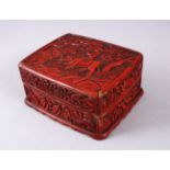 A 19TH / 20TH CENTURY CHINESE CINNABAR LACQUER LIDDED BOX, depicting a man upon elephant in a