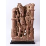 A RARE AND LARGE 11TH / 12TH CENTURY CENTRAL INDIAN CARVED STONE FIGURE OF GANESH WITH HIS WIFE,