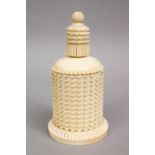 A CARVED INDIAN IVORY CIRCULAR BOX AND COVER, 6ins high.