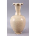 A GOOD CHINESE DING STYLE PORCELAIN FLARED RIM VASE, with a crackle glaze and a chased decoration,