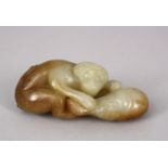A CHINESE CARVED JADE FIGURE OF A MONKEY UPON A GOURD, 10CM