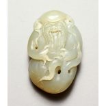 A GOOD CHINESE CARVED JADE PEBBLE OF SHOU LAO, the carving depicting shou lao god of longevity, 7.