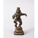 A FINE 17TH CENTURY INDIAN BRONZE FIGURE OF BABY KRISHNA, 7CM