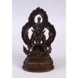 A GOOD CHINESE / TIBETAN BRONZE FIGURE OF A MULTI ARM DEITY, seated upon a lotus base , the arms