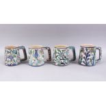 A COLLECTION FOUR EARLY 20TH CENTURY IZNIK STYLE JERUSALEM PALESTINIAN POTTERY TANKARDS, with