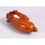 A GOOD CHINESE CARVED & STAINED ANTLER SNUFF BOTTLE IN THE FORM OF AN EGGPLANT, with carved foliage,
