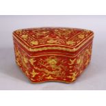A CHINESE MING STYLE RED GROUND DRAGON PORCELAIN LIDDED BOX, with dragons and clouds, the base