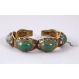 A GOOD CHINESE 19TH CENTURY GILT SILVER FILIGREE, ENAMEL & GREEN JADE BRACELET, 19cm open.