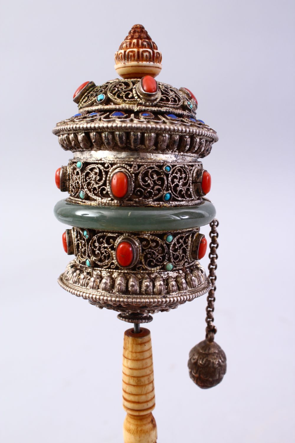 A GOOD 19TH CENTURY TIBETAN WHITE METAL AND INLAID PRAYER WHEEL, the wheel with filigree style metal - Image 2 of 3