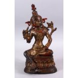 A LARGE TIBETAN GILT BRONZE FIGURE OF A SEATED GODDESS " AVALAOKITESWARA", in a seated position with
