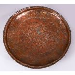 A GOOD ISLAMIC / PERSIAN SILVERED COPPER BEATEN DISH, with formal decoration, and motif
