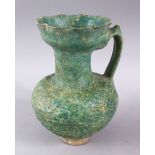 A GOOD 13TH CENTURY KASHAN TURQUOISE GLAZED POTTERY VASE, the vase with a moulded flared rim, carved