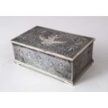 A 19TH CENTURY THAI NIELLO SILVER INLAID BOX, with figure and scroll decoration and a wooden