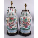 A GOOD PAIR OF 19TH CENTURY CANTON CHINESE FAMILLE ROSE PORCELAIN VASES, the body with a pink ground