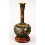 A GOOD JAPANESE MEIJI PERIOD CLOISONNE ENAMEL BOTTLE VASE, the body decorated with wire to depict