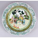 A LARGE CHINESE REPUBLIC STYLE FAMILLE ROSE SERPENTINE EDGE PORCELAIN CHARGER, the charger decorated