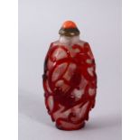 A GOOD 19TH / 20TH CENTURY CHINESE RED OVERLAY GLASS SNUFF BOTTLE, with a coral stopper and an ivory