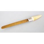 A 19TH CENTURY CHINESE CARVED IVORY & HORN PAGE TURNER, the carved bone handle ith a silver hall