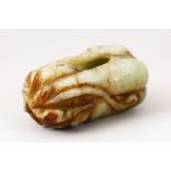 A GOOD 20TH CENTURY CHINESE CARVED JADE BRUSH WASH IN THE FORM OF A FRUIT, 9cm wide.