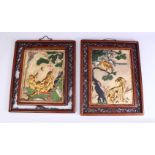 A PAIR OF CHINESE 19TH CENTURY CARVED & POLYCHROMED SOAPSTONE PANELS, carved with immortal figure