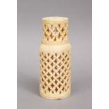 A GOOD 19TH CENTURY CHINESE CARVED IVORY OPENWORK CRICKET CAGE, 9.6cm high x 4cm.
