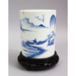 A CHINESE BLUE & WHITE PORCELAIN BRUSH WASHER & HARDWOOD STAND, The body of the pot decorated with