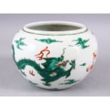 A CHINESE FAMILLE VERTE PORCELAIN DRAGON BRUSH WASH, with dragons amongst clouds, 16.5cm dia.