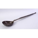 A 12TH/13TH CENTURY PERSIAN SELJUK ENGRAVED IRON LADLE, with foliate and figural decoration, 48cm