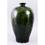A GOOD SONG STYLE CHINESE CI ZHOU POTTERY MEIPING FISH VASE, decorated with leaping fish amongst