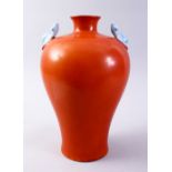 A GOOD CHINESE CORAL RED TWIN BAT HANDLED PORCELAIN MEIPING VASE, the body with a coral red