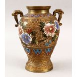 A JAPANESE CLOISONNE ENAMEL TWIN HANDLED VASE, decorated to depict floral display, 21.5cm high