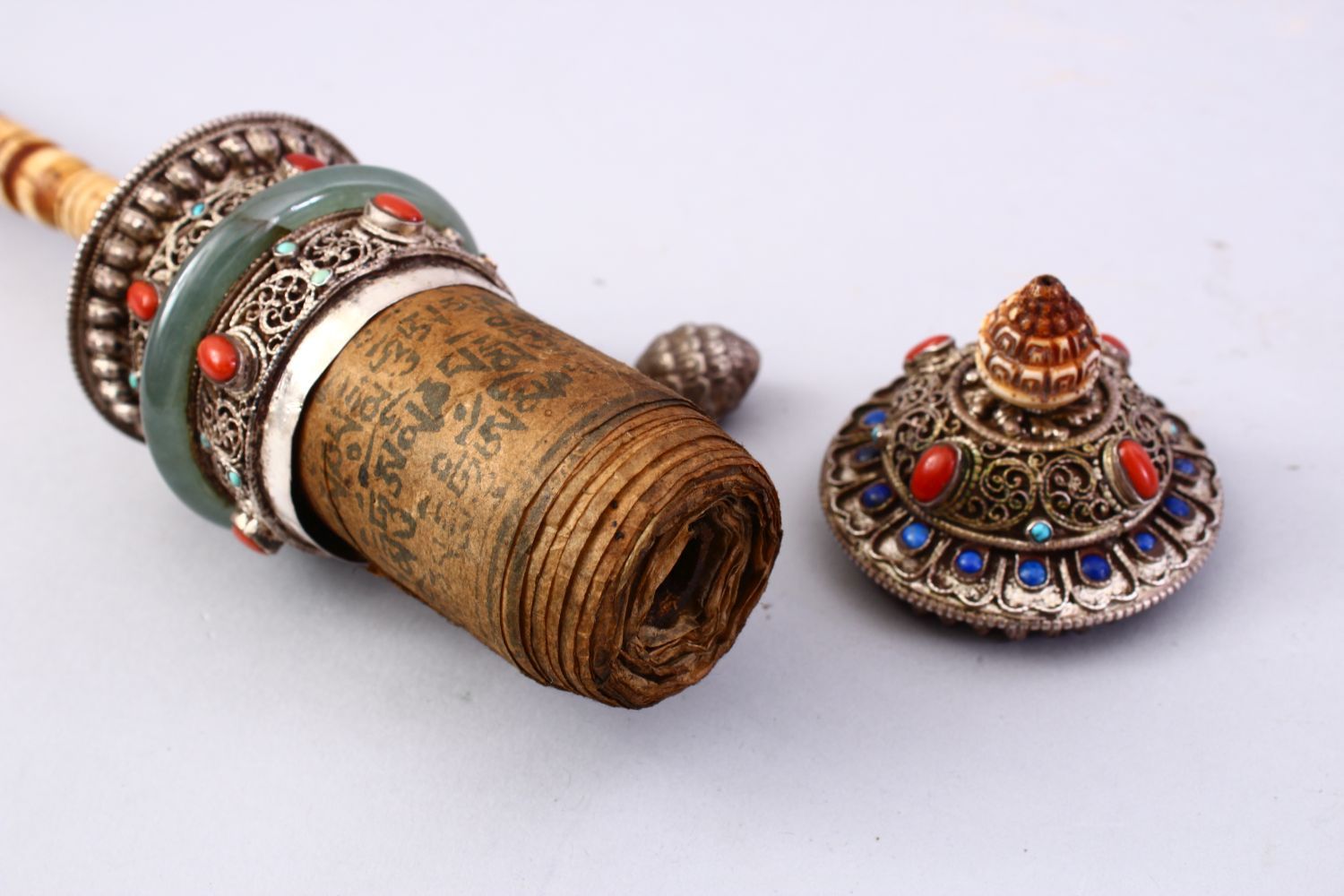 A GOOD 19TH CENTURY TIBETAN WHITE METAL AND INLAID PRAYER WHEEL, the wheel with filigree style metal - Image 3 of 3