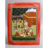 AN INDIAN MUGHAL MINIATURE PAINTING OF FIGURES SEATED IN A GARDEN, 31CM X 24CM