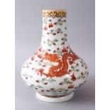 A CHINESE FAMILLE ROSE PORCELAIN BOTTLE SHAPED VASE, decorated with an iron red dragon & phoenix