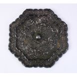 A LARGE 18TH CENTURY OR EARLIER CHINESE TANG STYLE BRONZE MIRROR, with decoration depicting