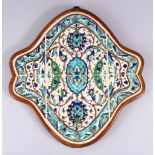 A 19TH CENTURY TURKISH KUTAHIYA FRAMED TILES, decorated in turquoise and other colours depicting